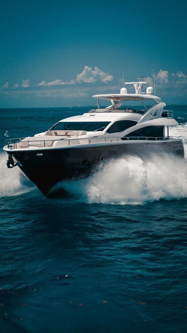 a boat splashing in the water aboard TATIS Yacht for Sale