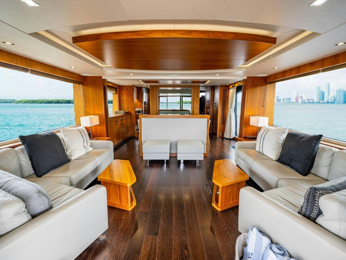 a living room with a large window aboard TATIS Yacht for Sale