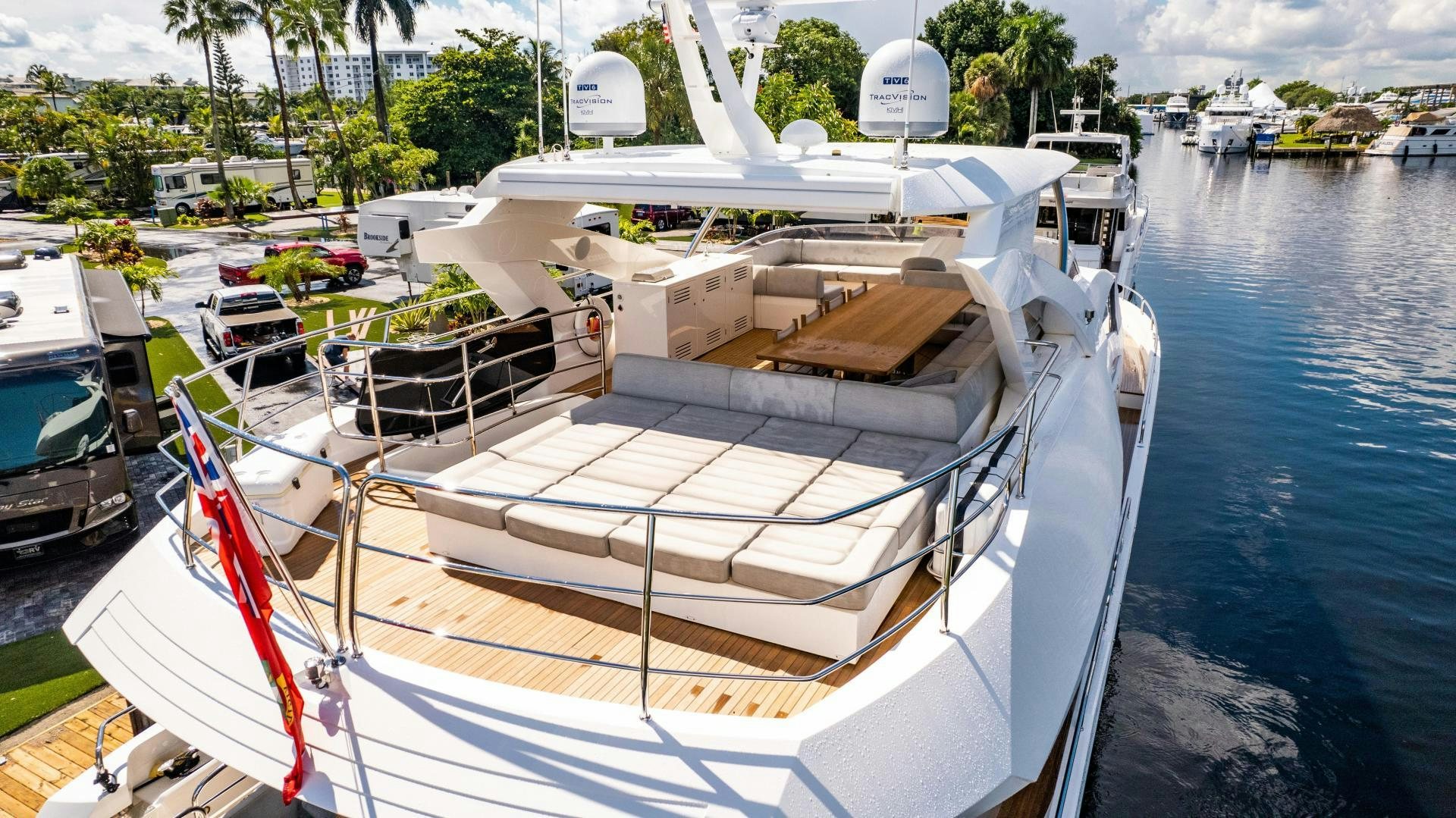 a boat with a deck and a boat on it aboard TATIS Yacht for Sale