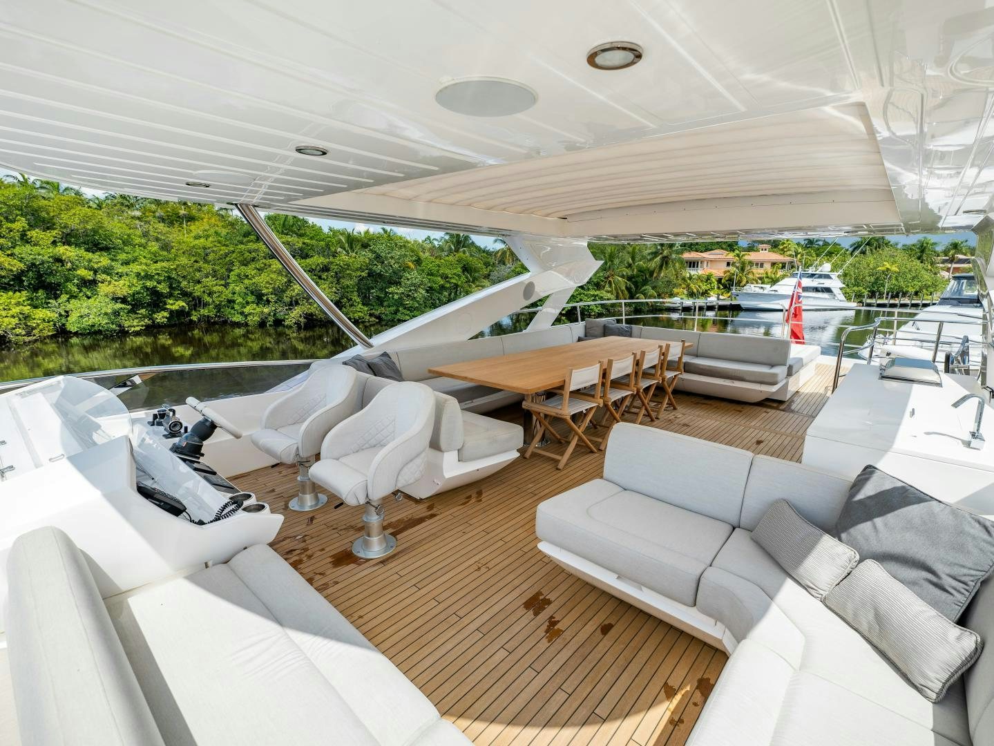 a room with couches and tables aboard TATIS Yacht for Sale