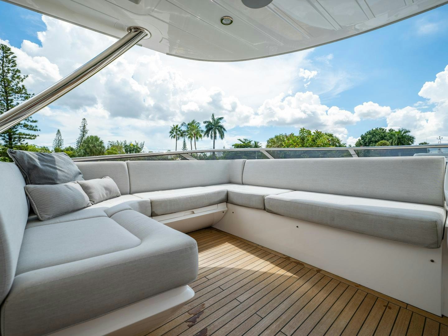 a room with a couch and a pool aboard TATIS Yacht for Sale