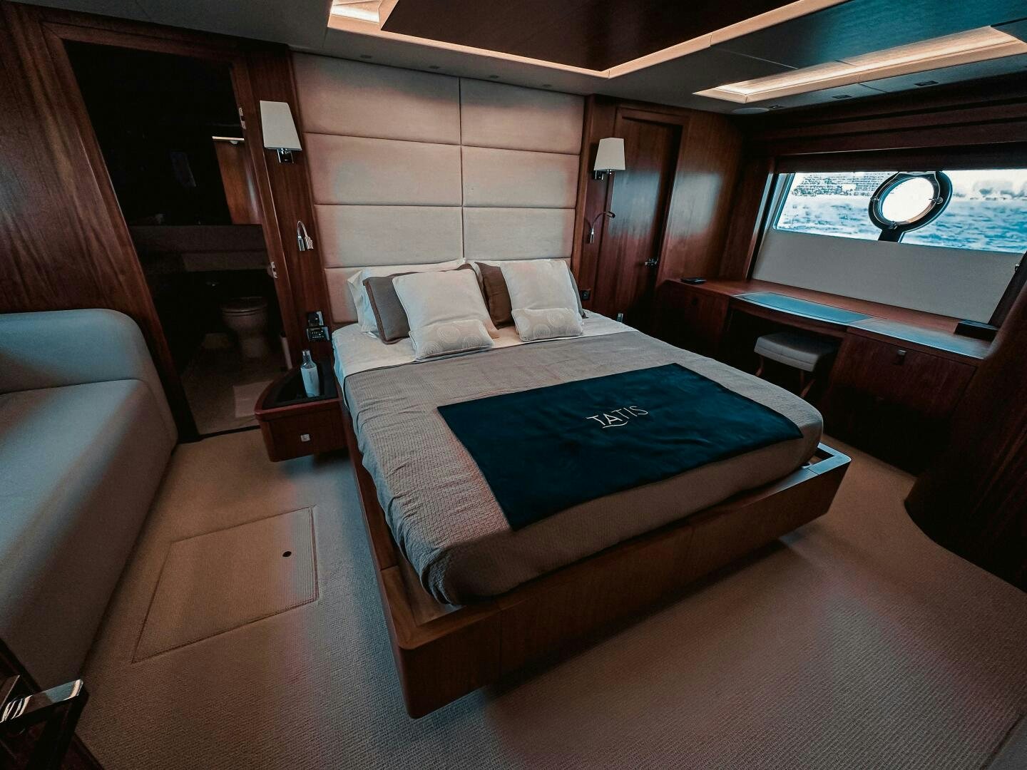 a bed in a cabin aboard TATIS Yacht for Sale