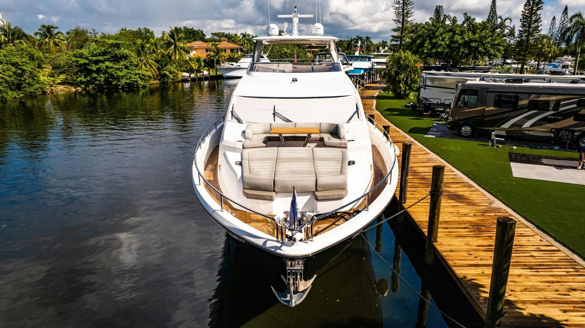 a boat docked at a pier aboard TATIS Yacht for Sale