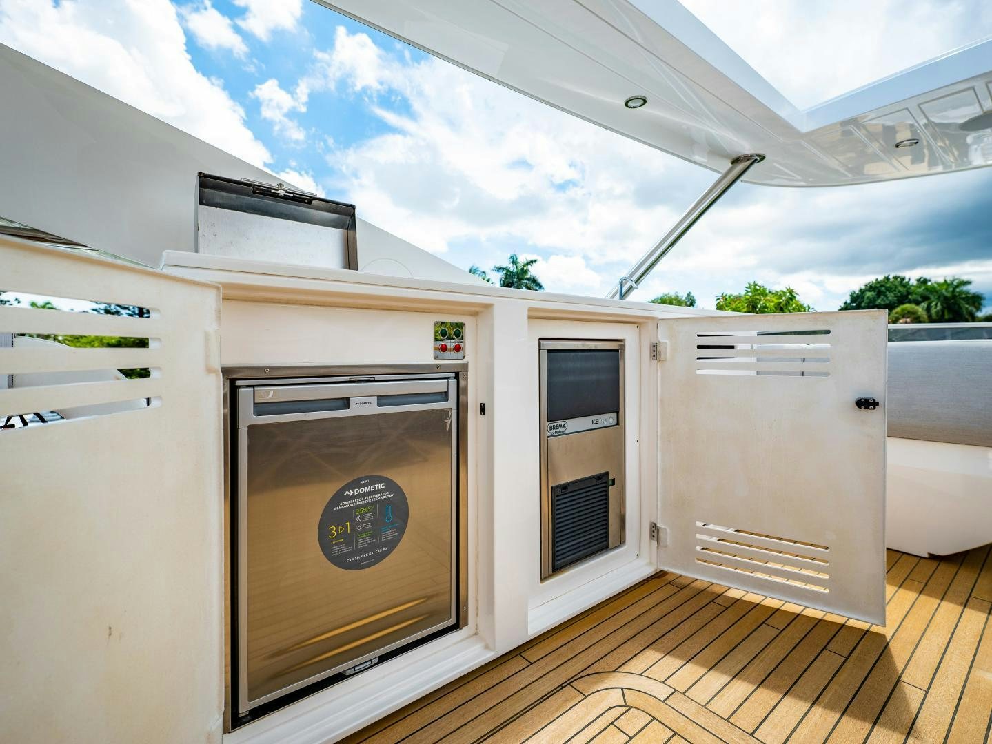 a room with a door and a window aboard TATIS Yacht for Sale