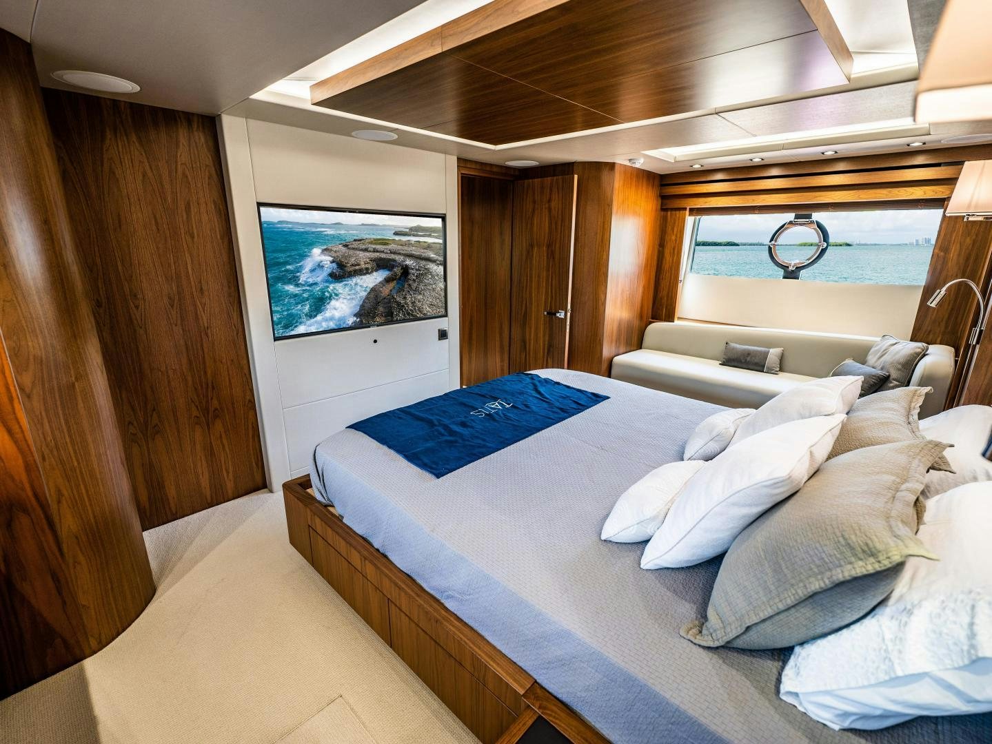 a bed in a room aboard TATIS Yacht for Sale