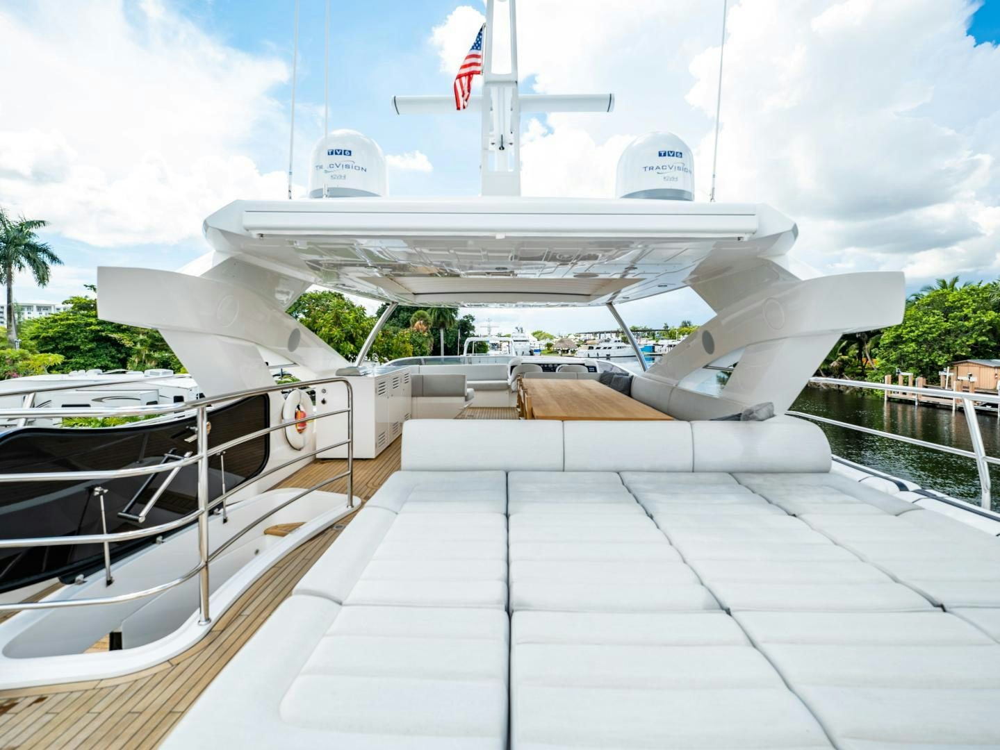 a large white airplane aboard TATIS Yacht for Sale