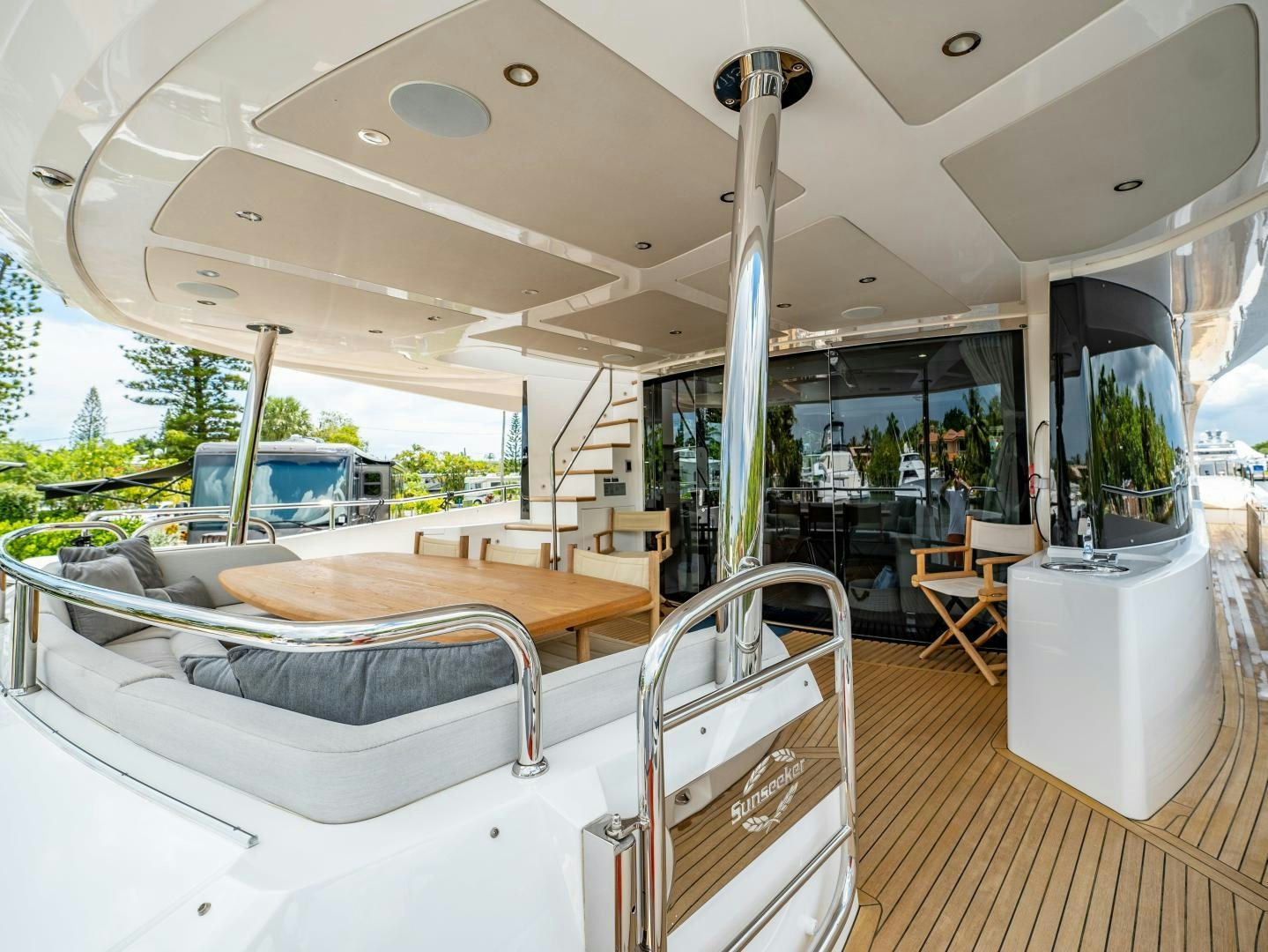 a room with a bed and a table aboard TATIS Yacht for Sale