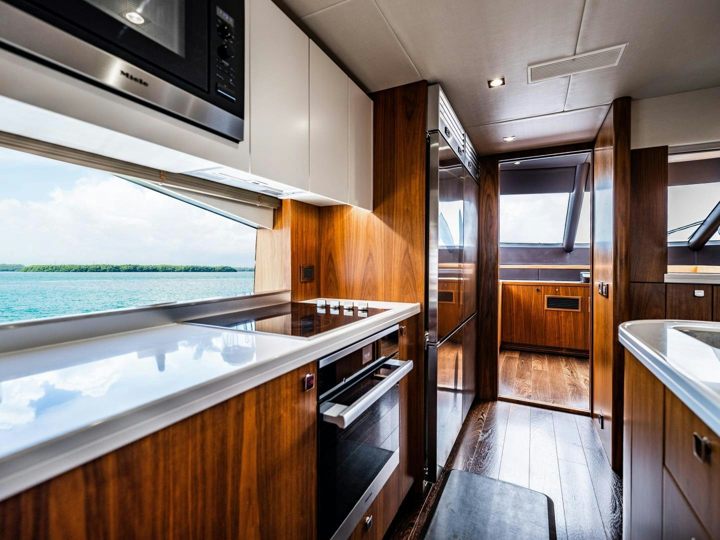 a kitchen with a large island aboard TATIS Yacht for Sale