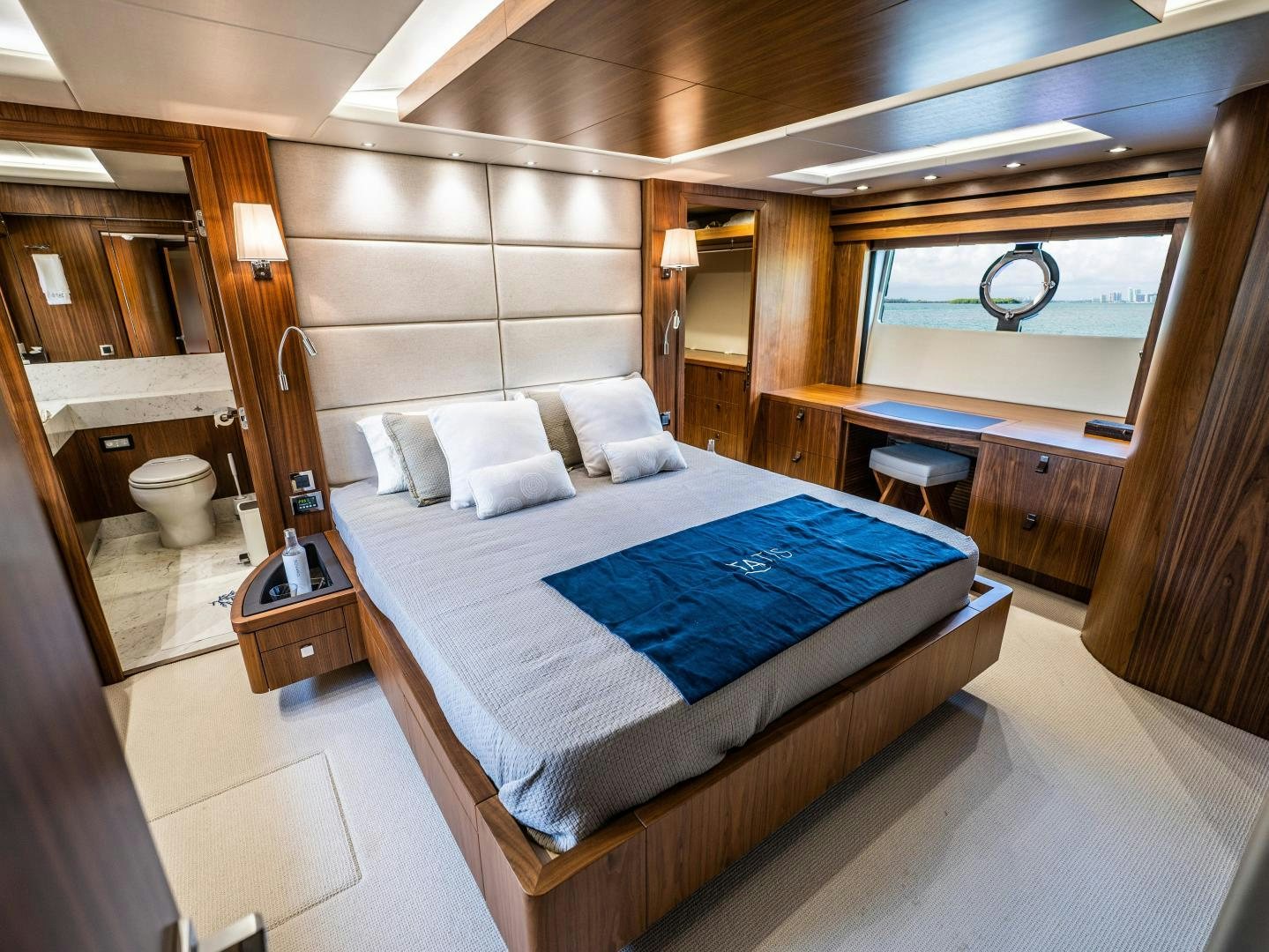 a bed in a room aboard TATIS Yacht for Sale