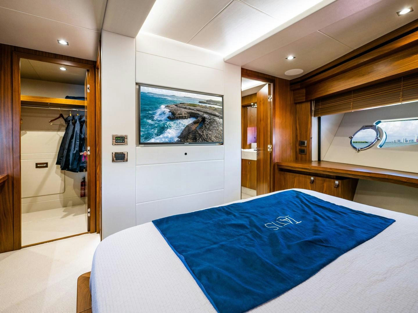 a bed in a room aboard TATIS Yacht for Sale