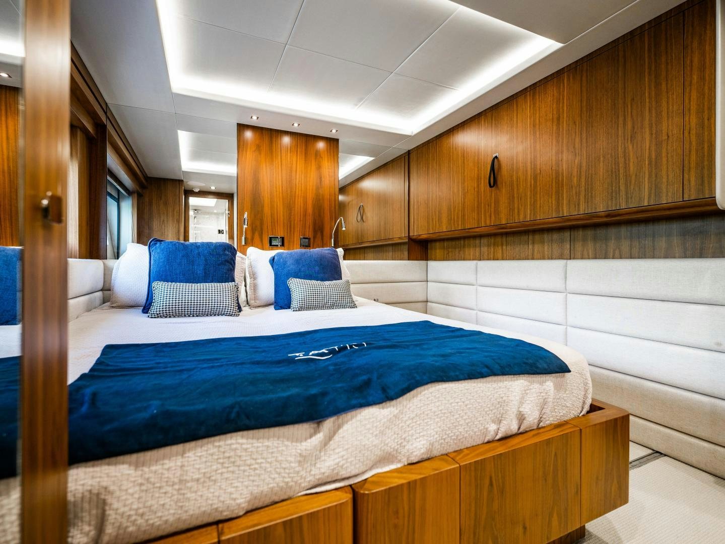 a bed in a room aboard TATIS Yacht for Sale