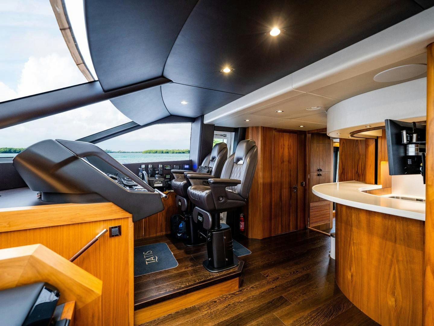 a room with a desk and a computer aboard TATIS Yacht for Sale