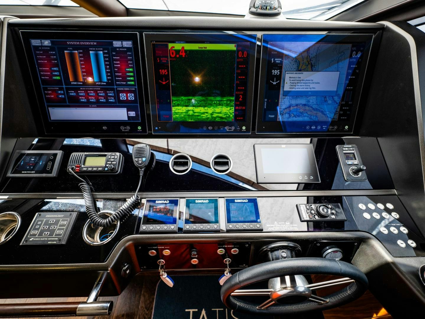 a control panel with many screens aboard TATIS Yacht for Sale