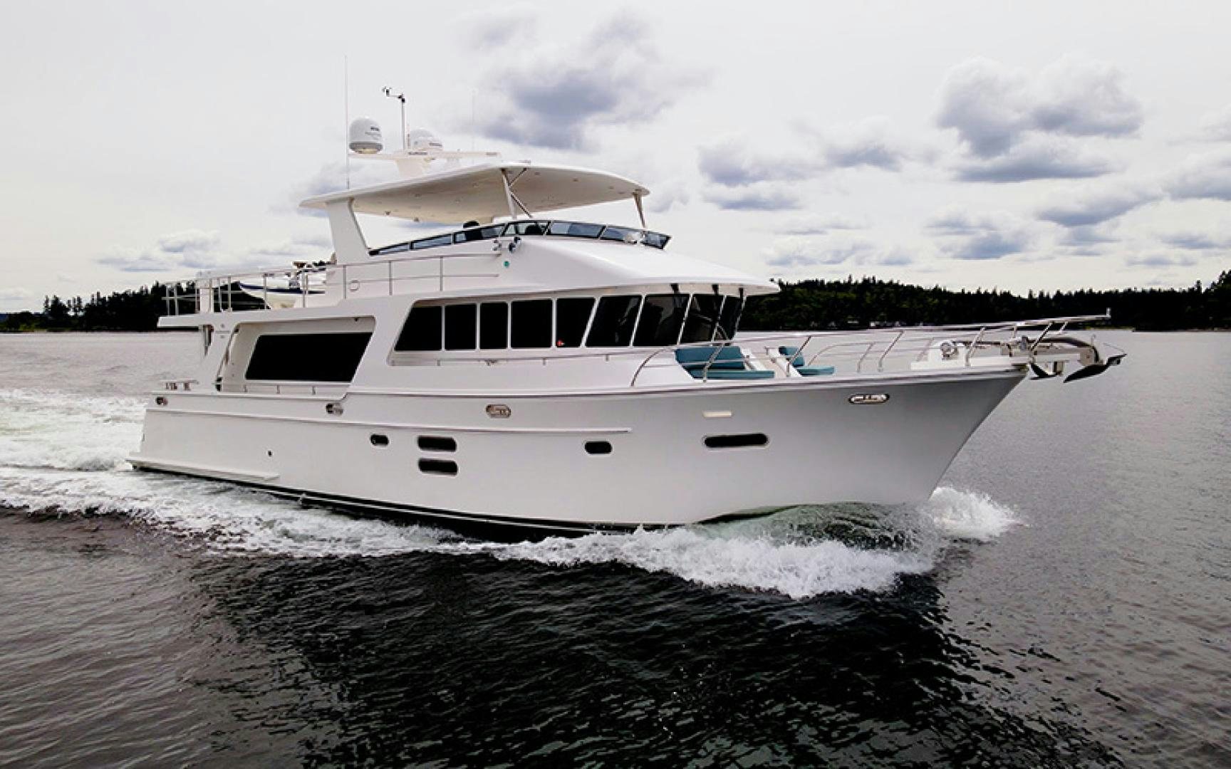 a white boat on the water aboard MAHALO Yacht for Sale