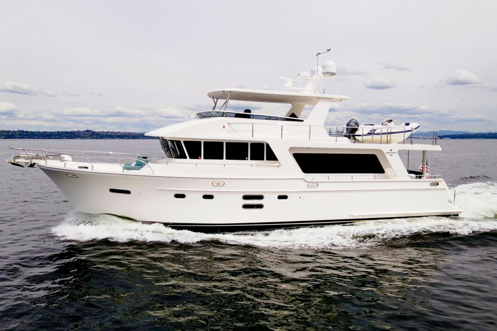 a white yacht in the water aboard MAHALO Yacht for Sale