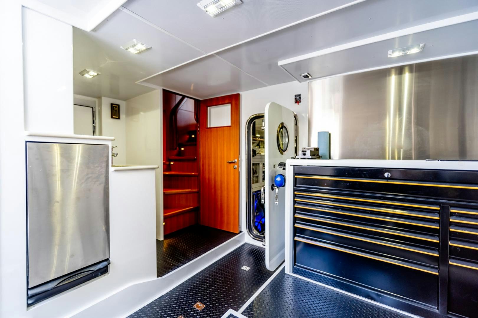 a room with a large mirror and a large oven aboard MAHALO Yacht for Sale