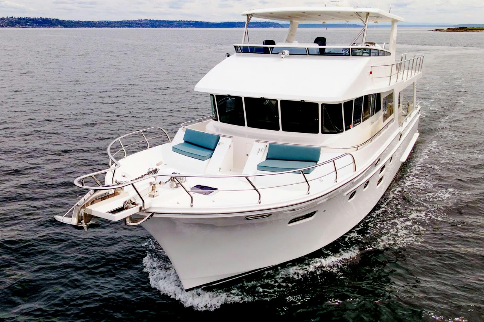 a white boat in the water aboard MAHALO Yacht for Sale