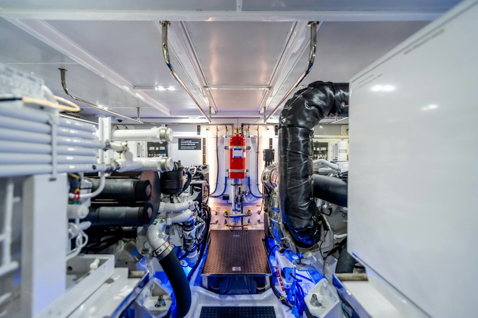 a room with a machine aboard MAHALO Yacht for Sale