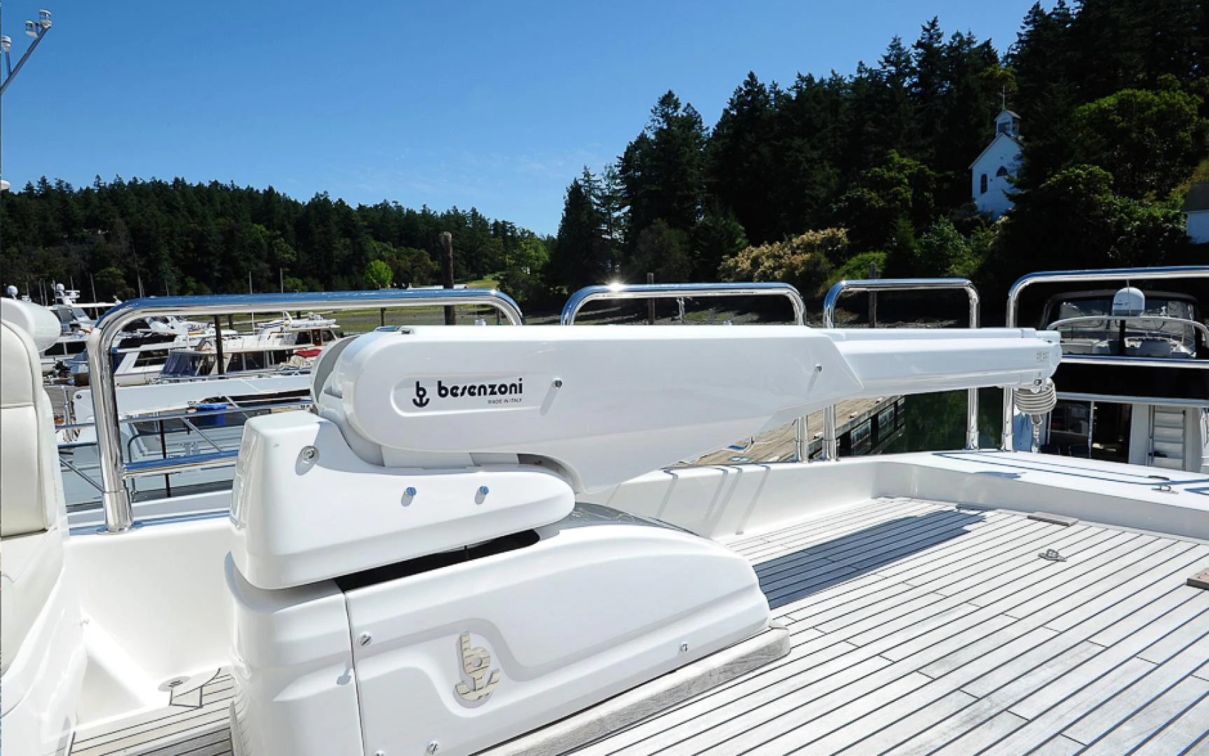 a white boat on a deck aboard MARANATHA Yacht for Sale