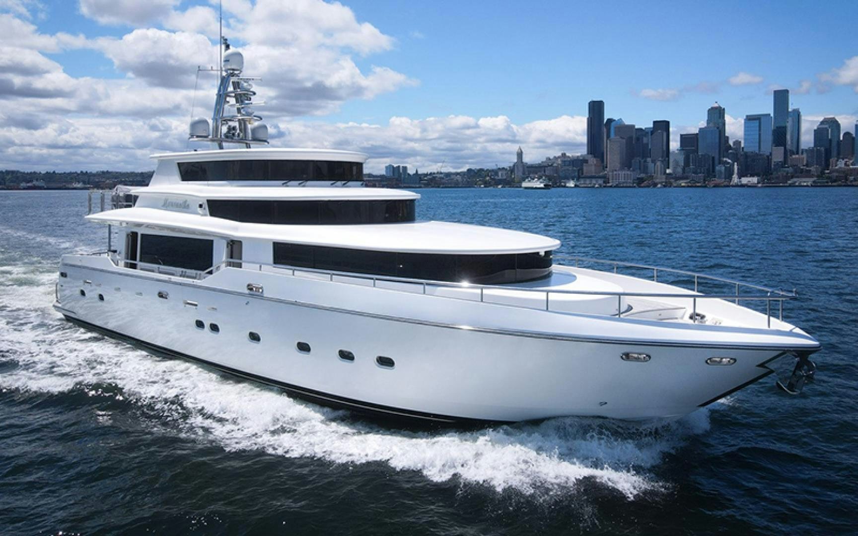 a white yacht in the water aboard MARANATHA Yacht for Sale