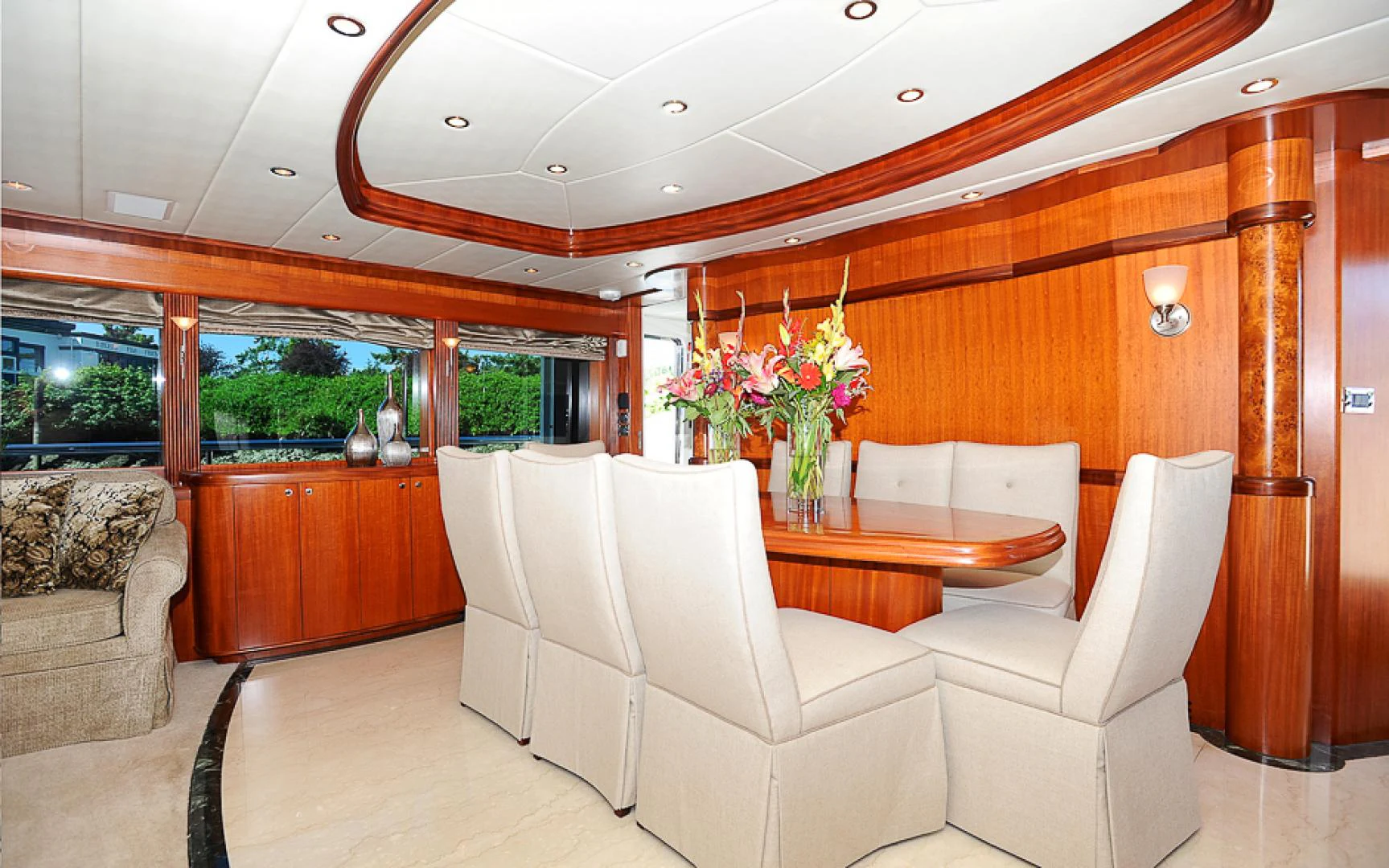 a room with couches and a table aboard MARANATHA Yacht for Sale