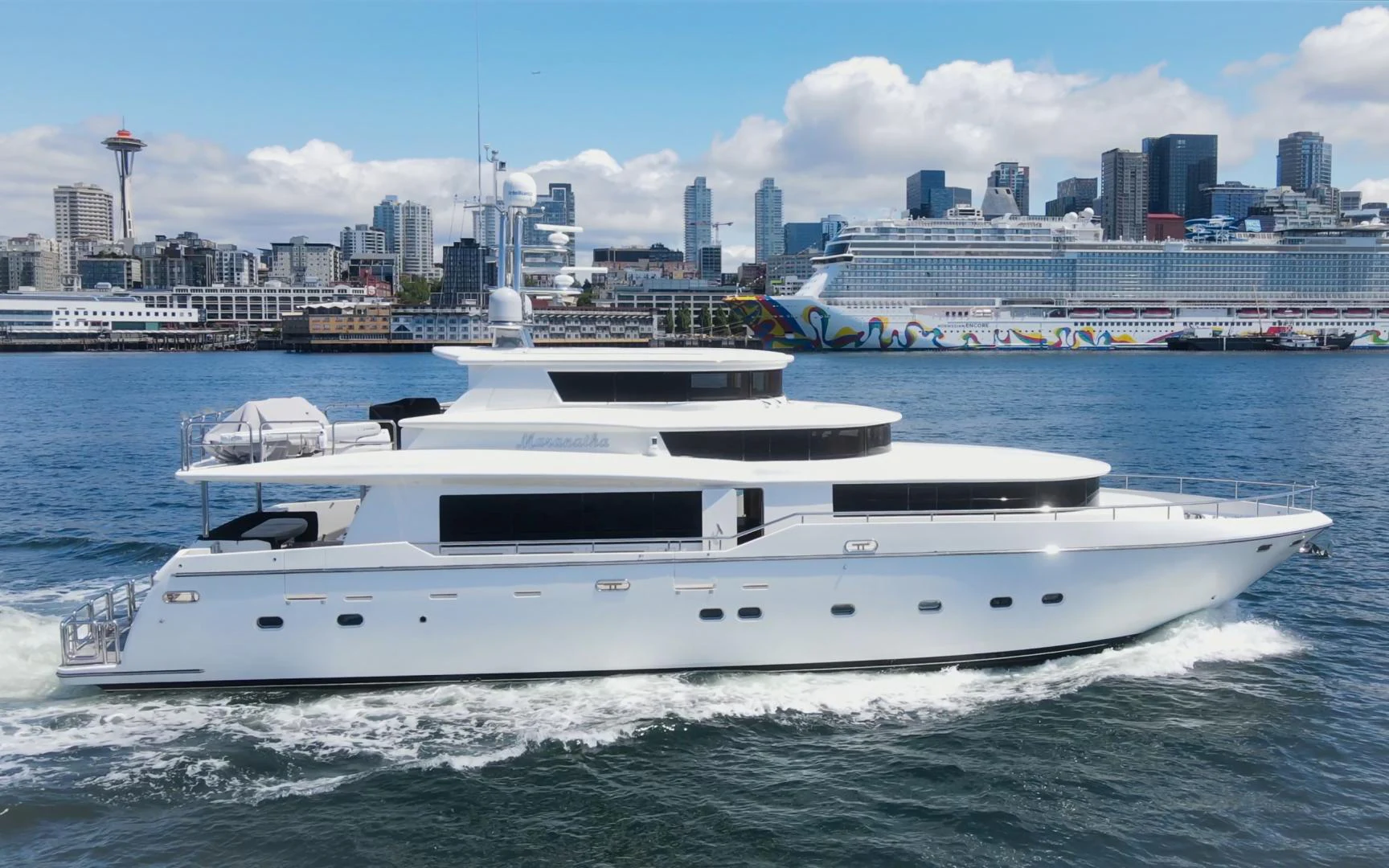 a white yacht in the water aboard MARANATHA Yacht for Sale