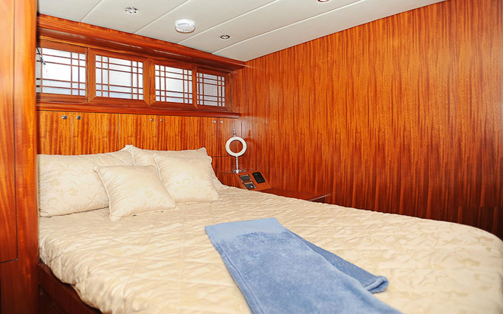 a couple of beds in a room aboard MARANATHA Yacht for Sale