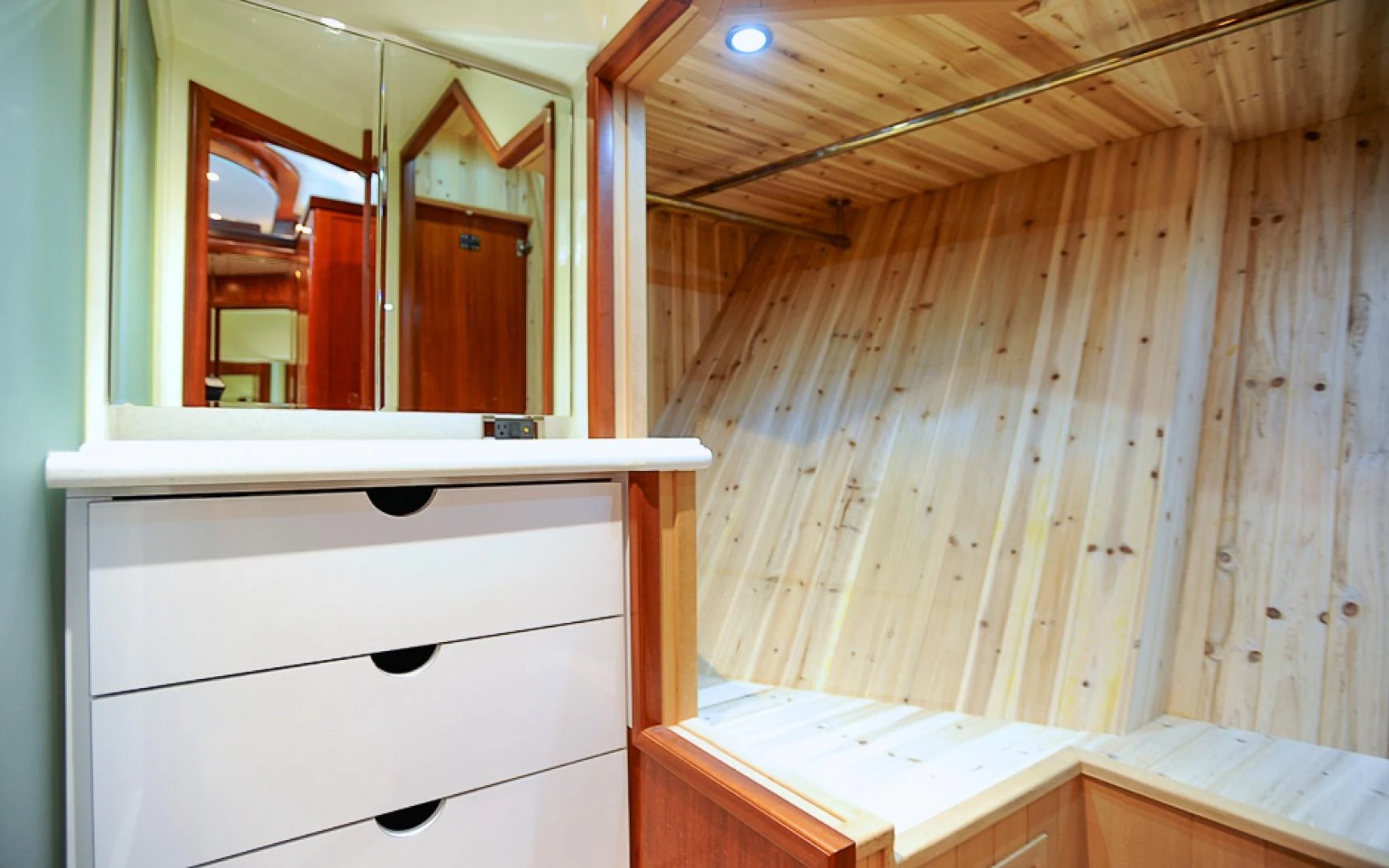 a room with a mirror and a shelf with a mirror aboard MARANATHA Yacht for Sale