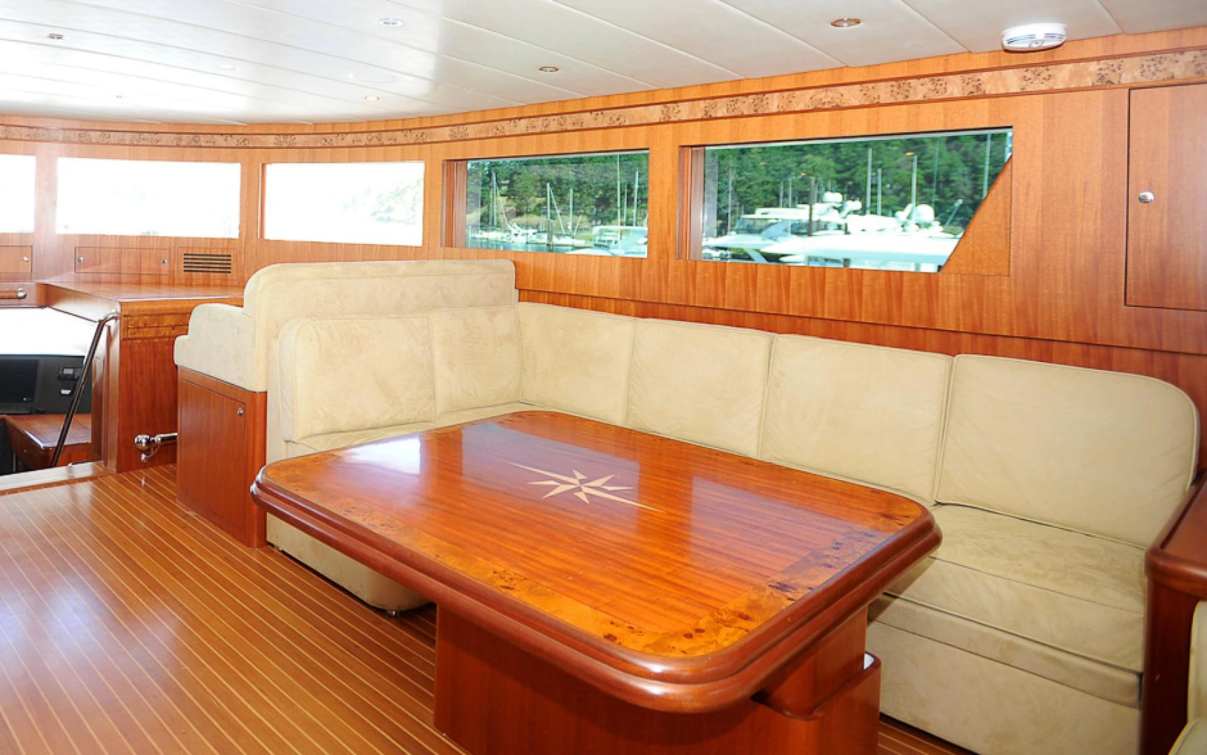 a room with a couch and a table aboard MARANATHA Yacht for Sale