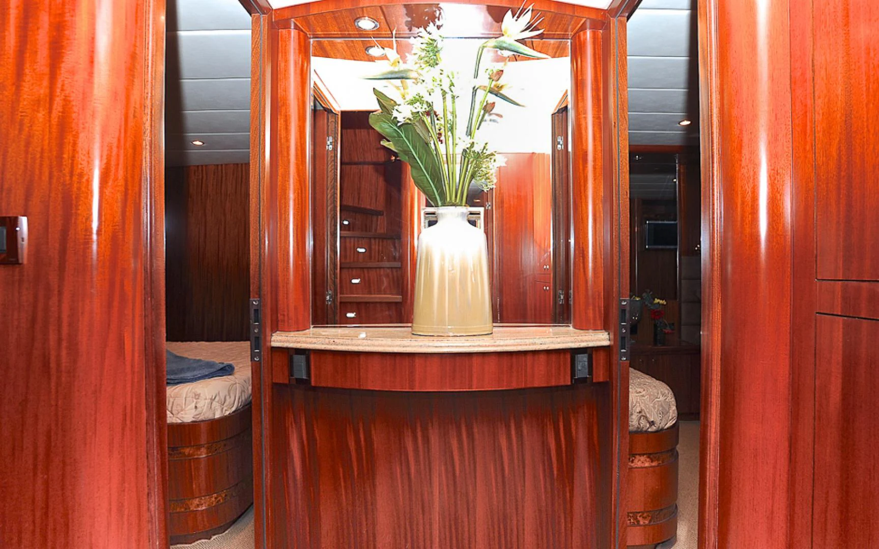 a vase with flowers on a table aboard MARANATHA Yacht for Sale