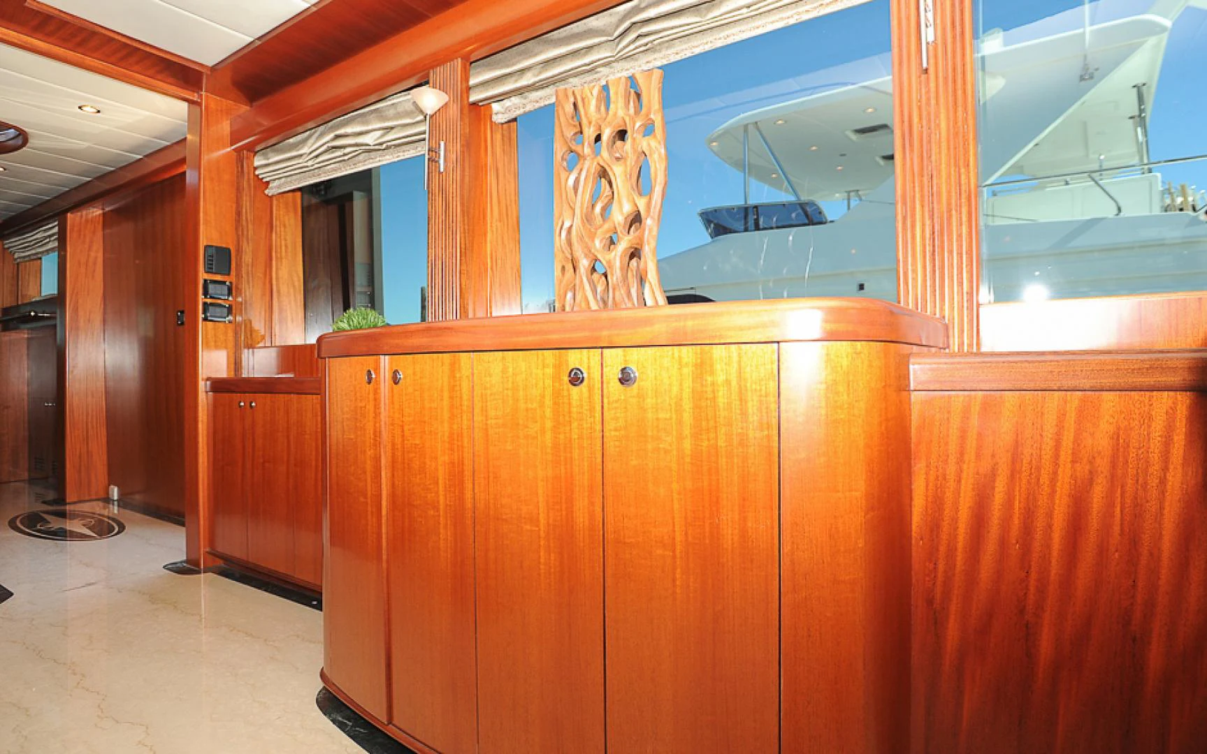 a room with wooden cabinets aboard MARANATHA Yacht for Sale