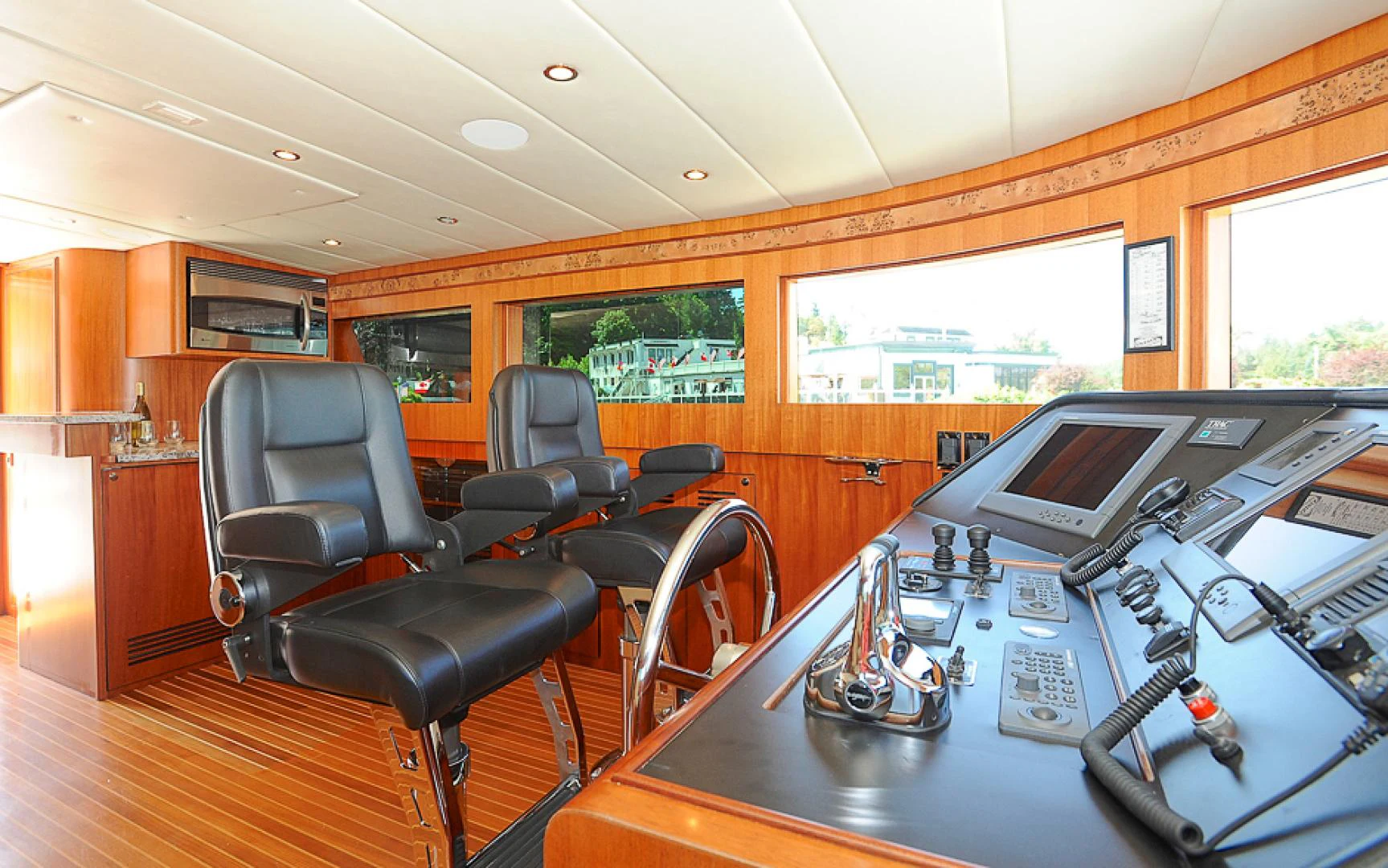 a room with a table and chairs aboard MARANATHA Yacht for Sale