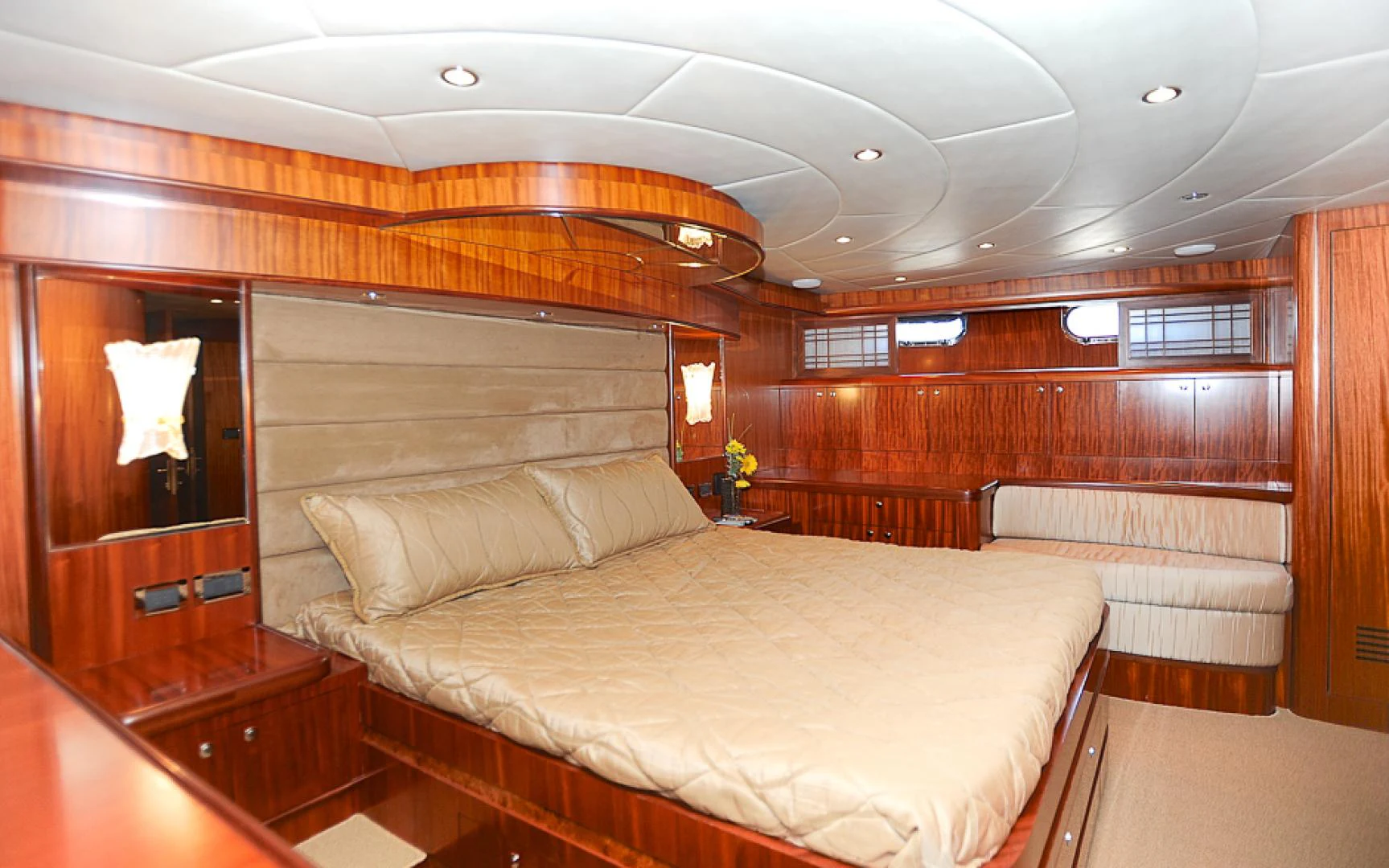a room with a bed and a wood wall aboard MARANATHA Yacht for Sale