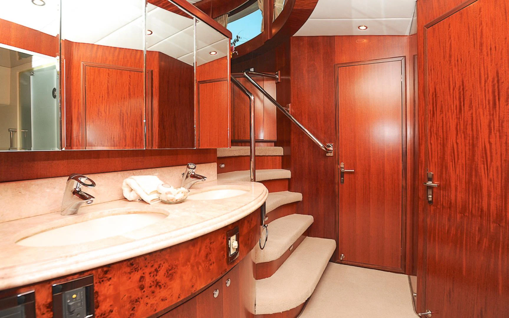 a bathroom with a sink and a shower unit aboard MARANATHA Yacht for Sale