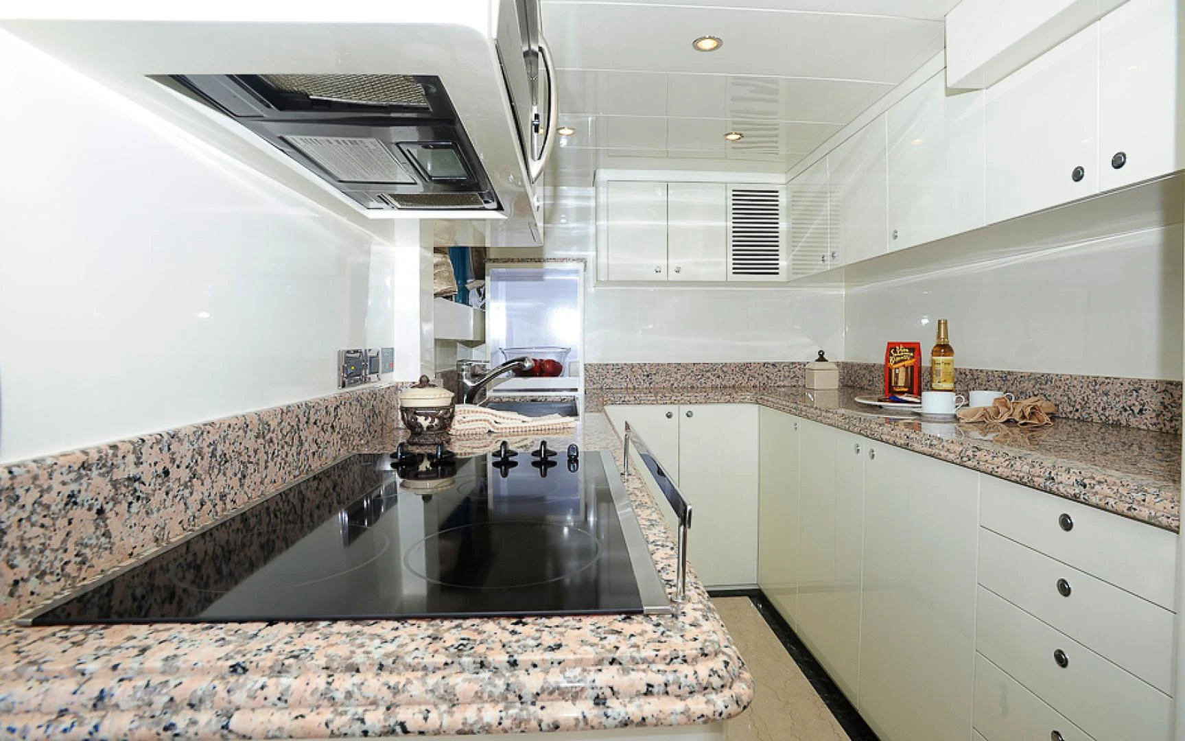 a kitchen with marble counters aboard MARANATHA Yacht for Sale