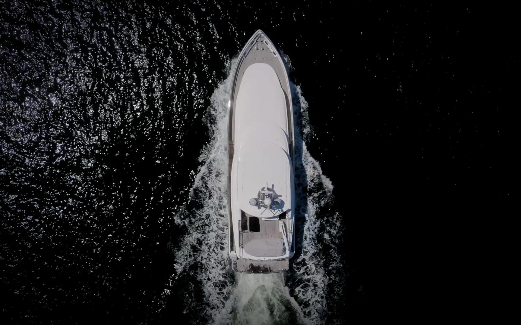 a snowboard on a snowy mountain aboard MARANATHA Yacht for Sale