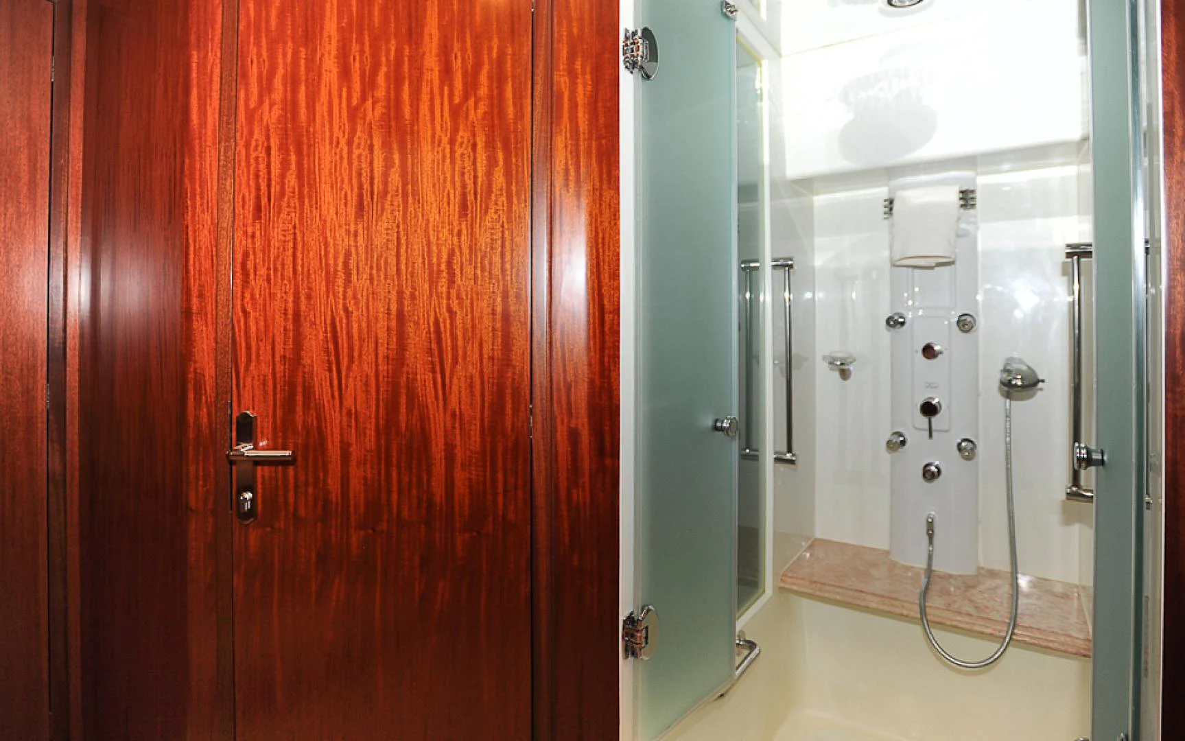 a room with a door and a mirror aboard MARANATHA Yacht for Sale