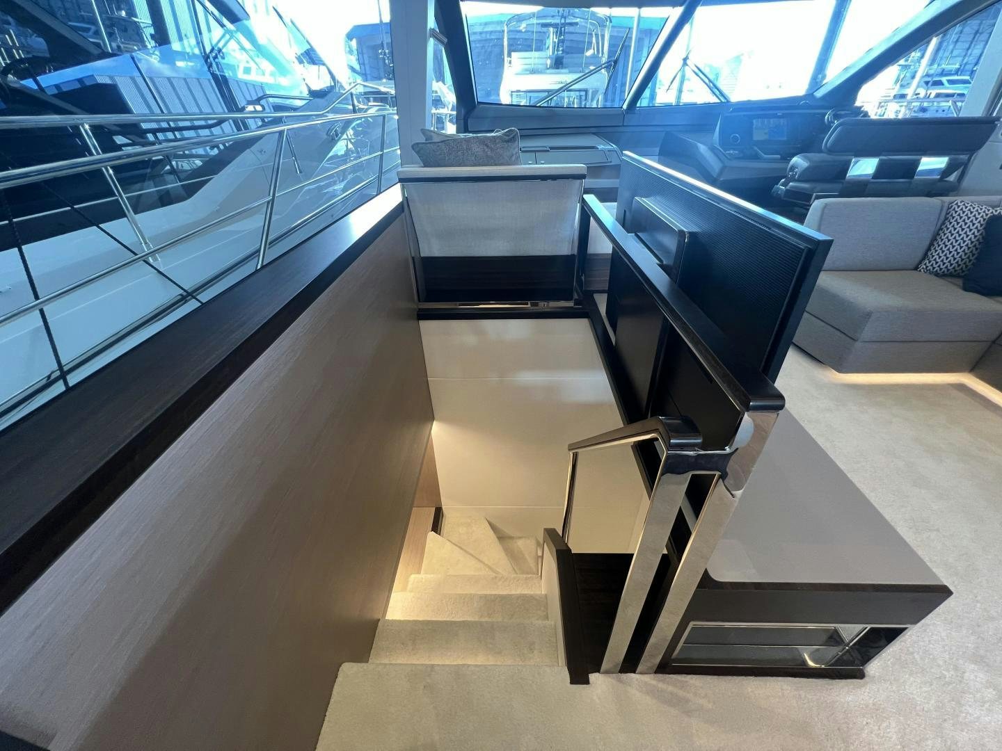 a black chair in a room aboard DELICIA Yacht for Sale