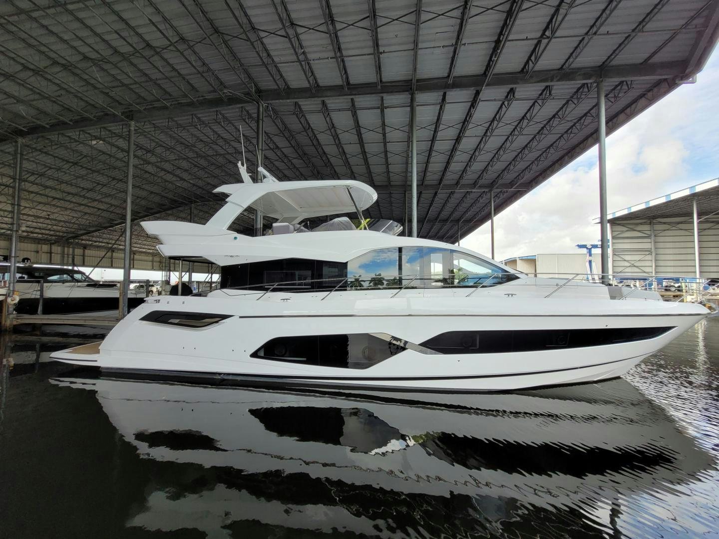 a boat in a harbor aboard DELICIA Yacht for Sale