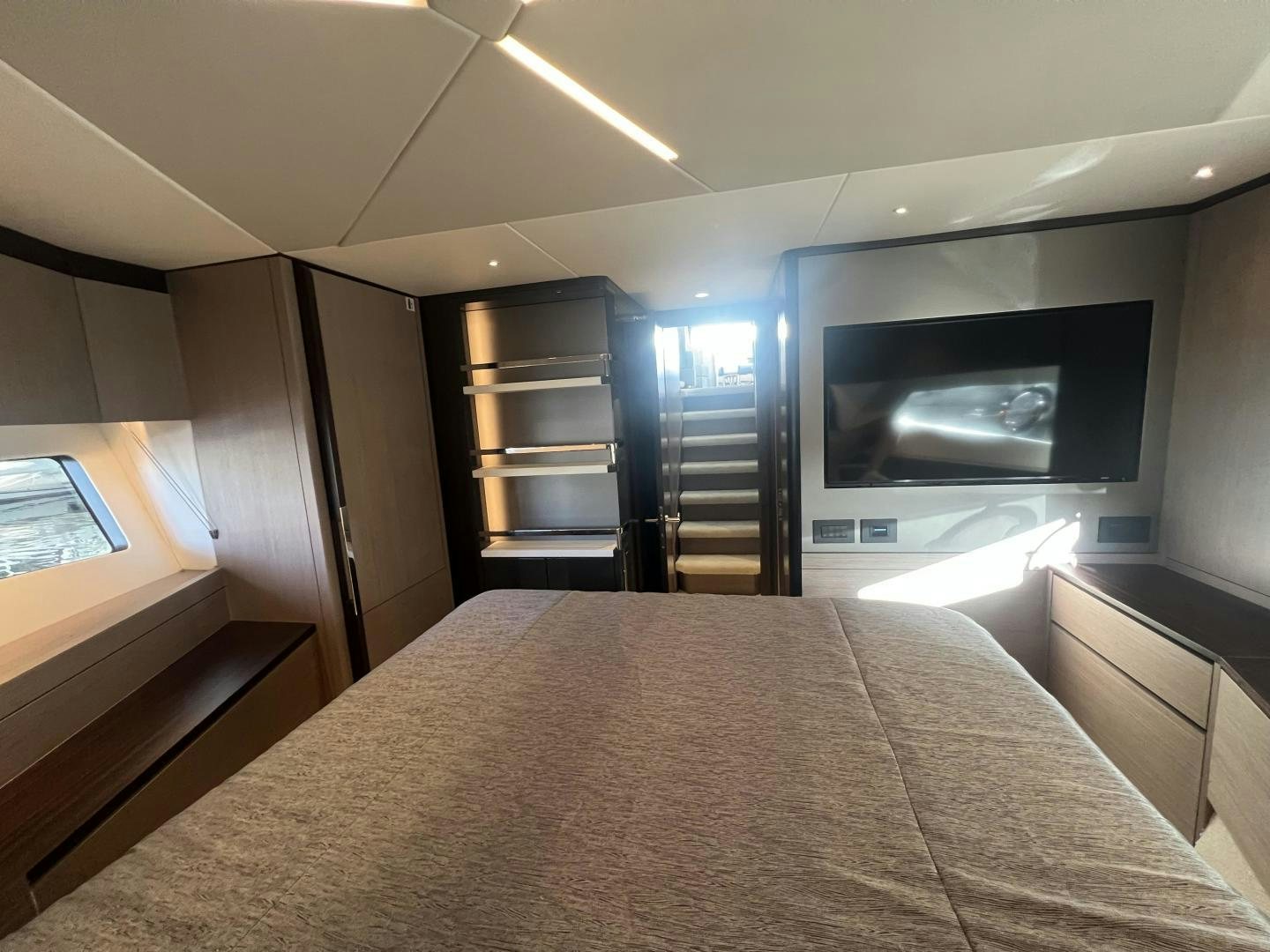 a bed in a room aboard DELICIA Yacht for Sale