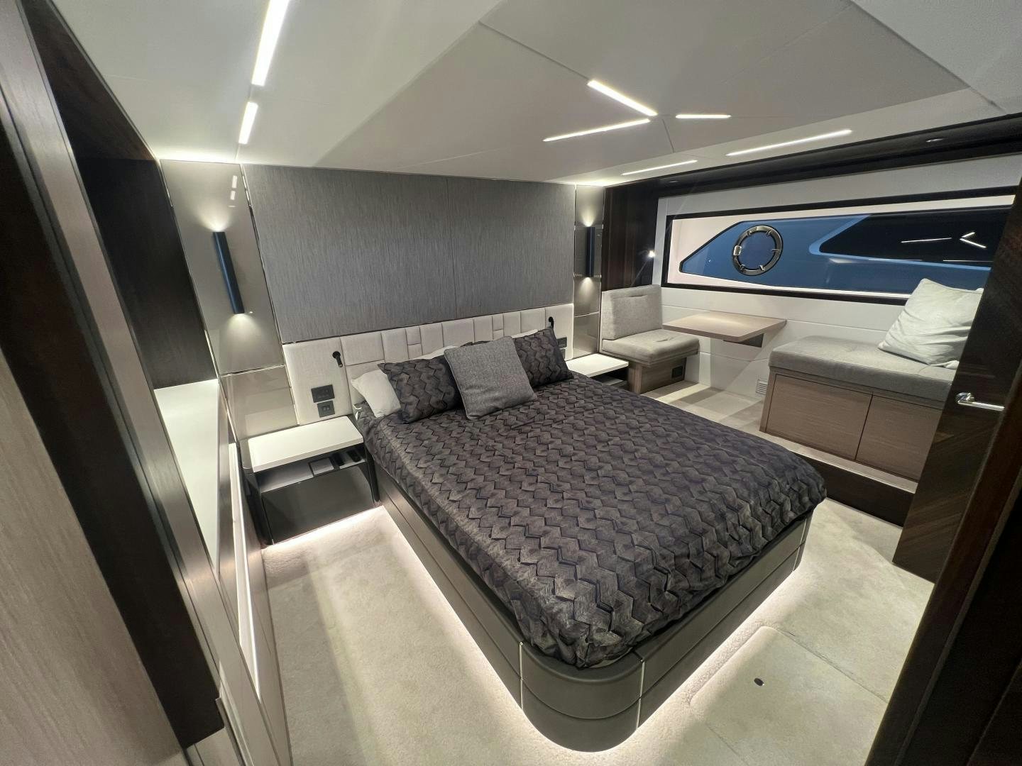 a large bedroom with a large bed aboard DELICIA Yacht for Sale