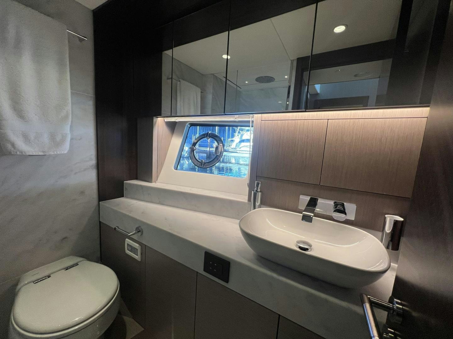 a bathroom with a sink and toilet aboard DELICIA Yacht for Sale