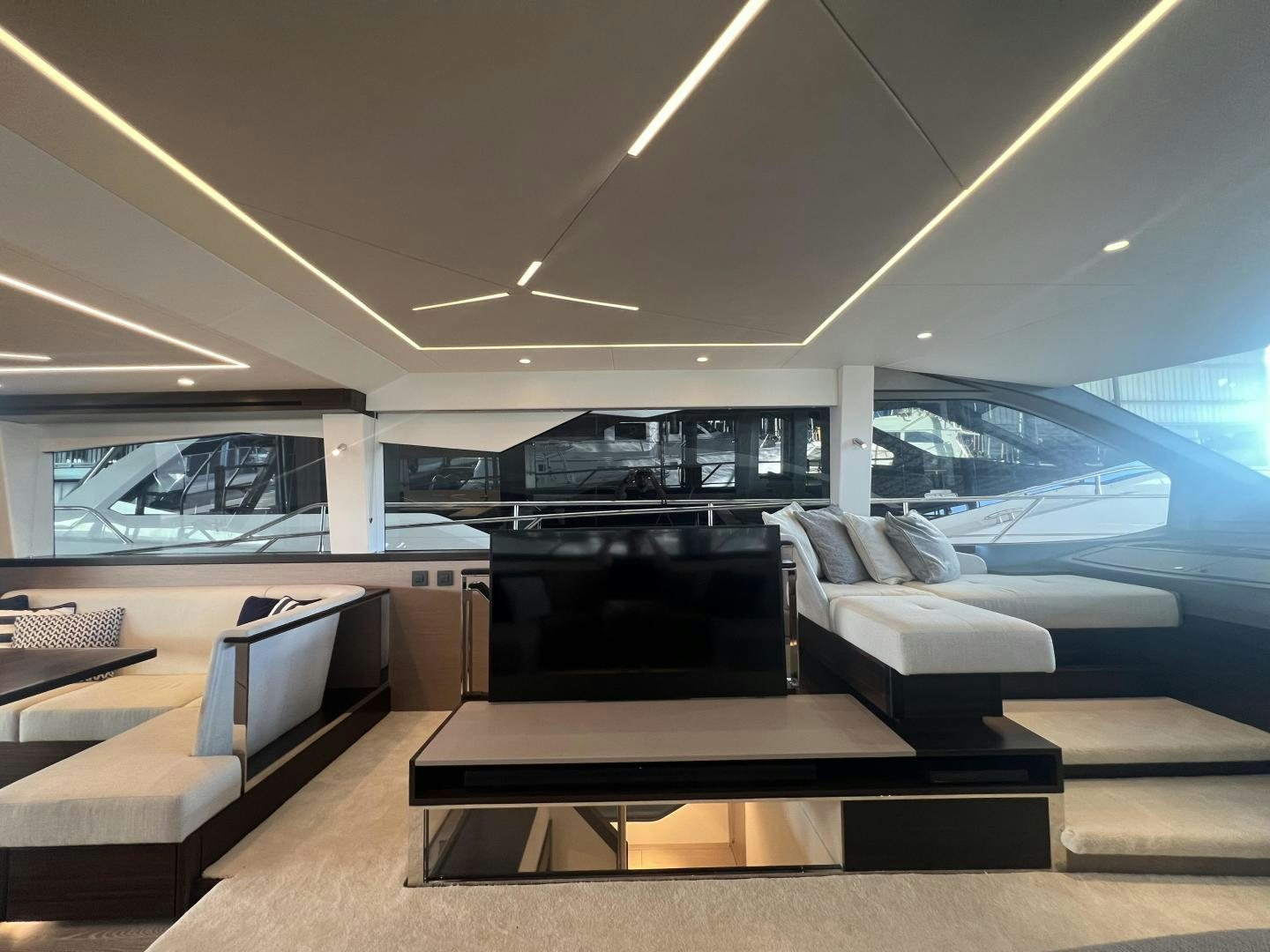 a room with a couch and a table aboard DELICIA Yacht for Sale