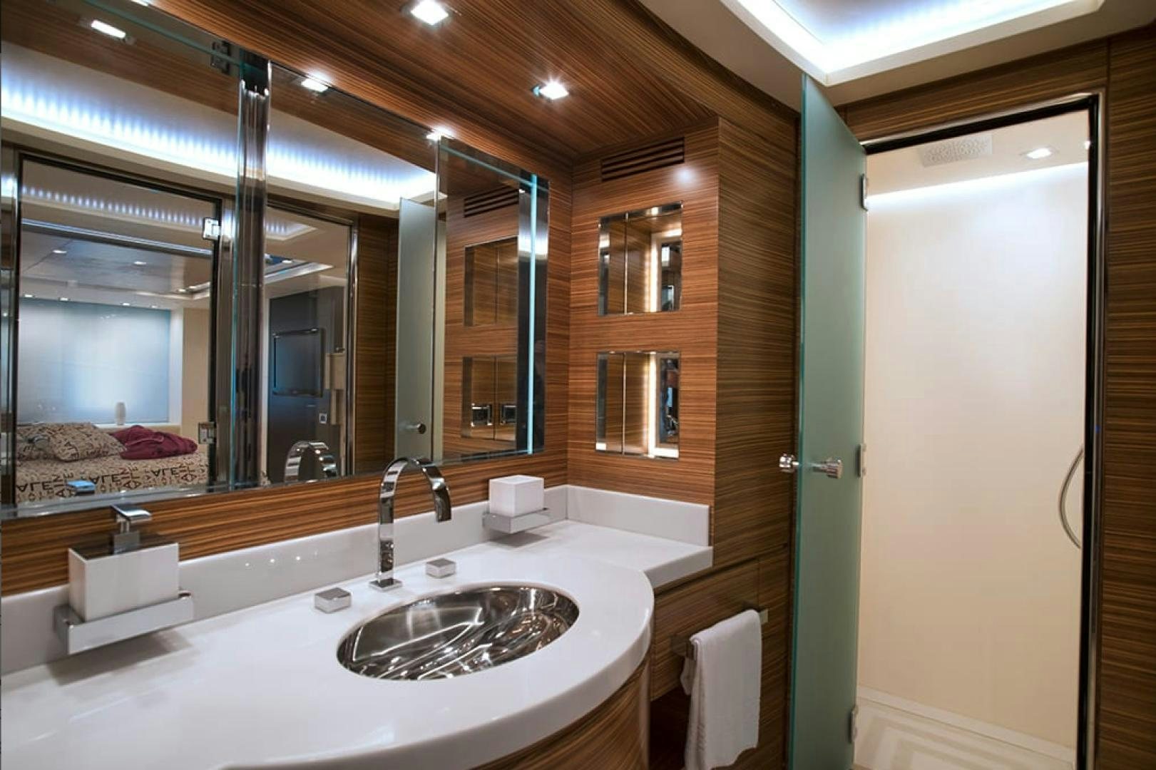 a bathroom with a large mirror aboard ALE.MIA Yacht for Sale