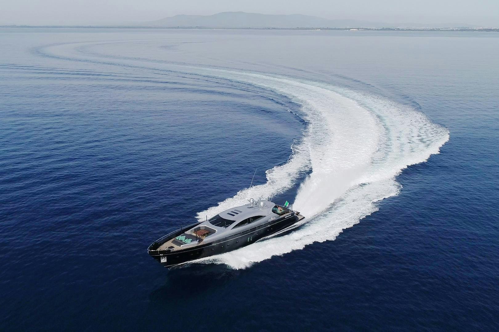 a car driving on a body of water aboard ALE.MIA Yacht for Sale