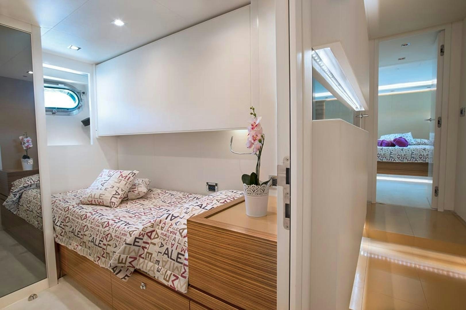 a bedroom with a bed aboard ALE.MIA Yacht for Sale