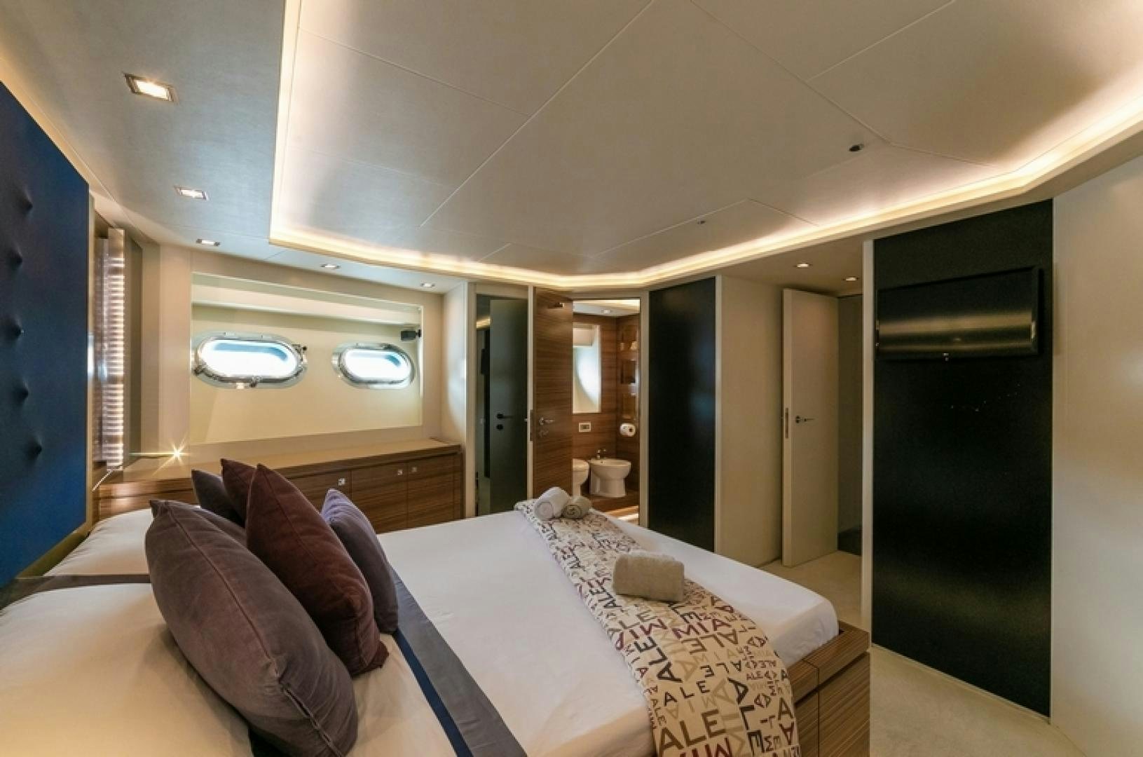 a hotel room with a bed aboard ALE.MIA Yacht for Sale