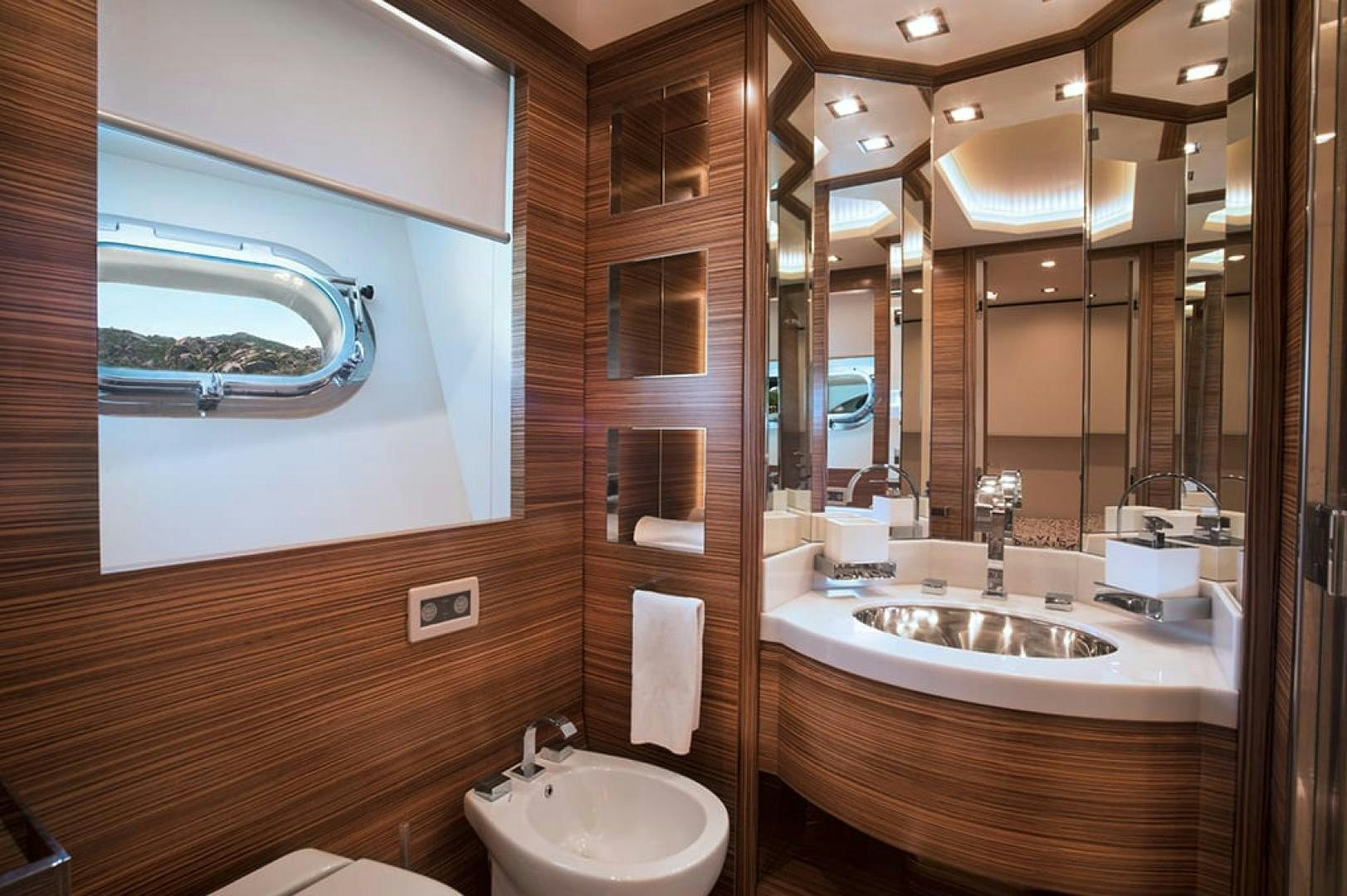 a bathroom with a sink and a mirror aboard ALE.MIA Yacht for Sale