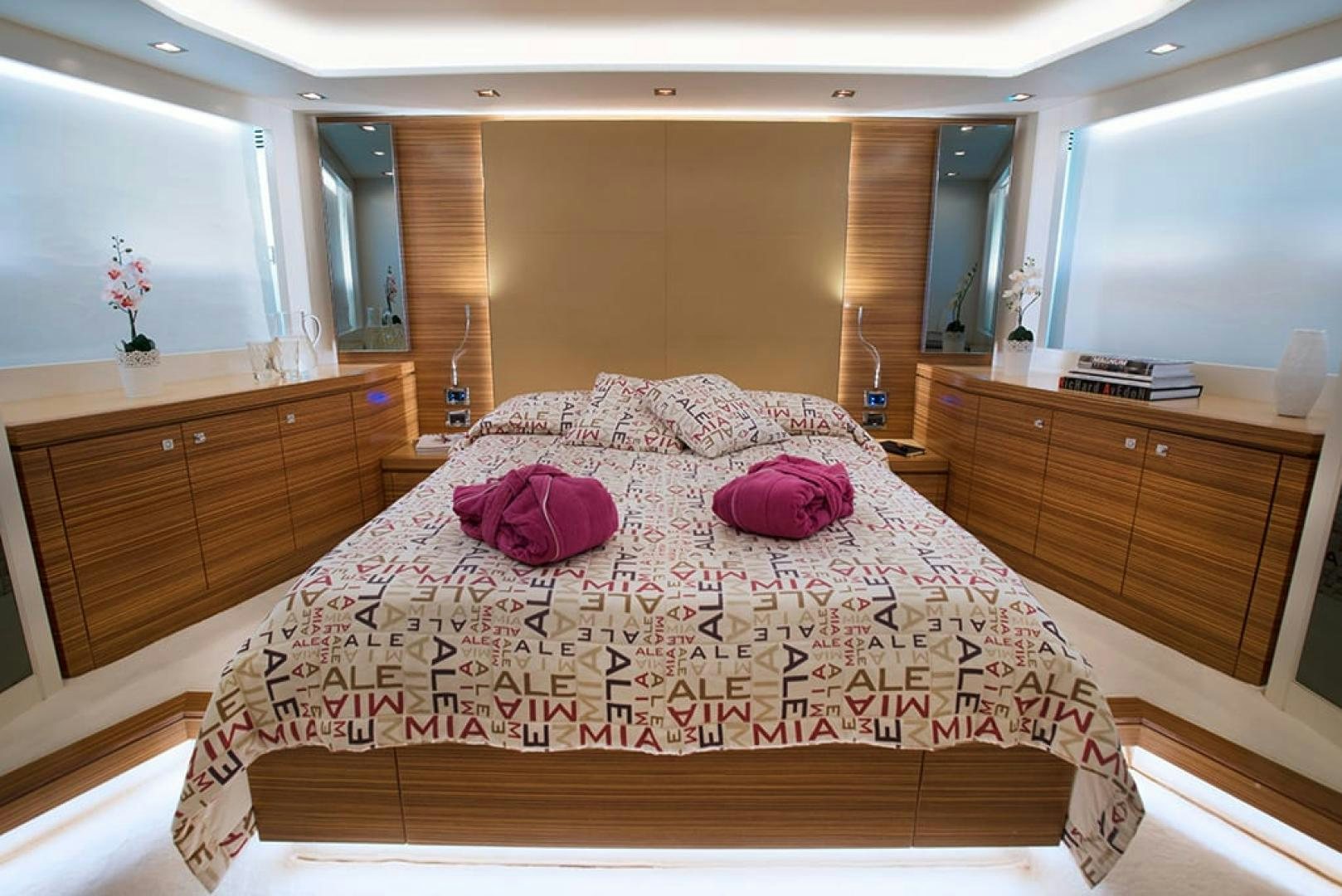 a bed in a room aboard ALE.MIA Yacht for Sale