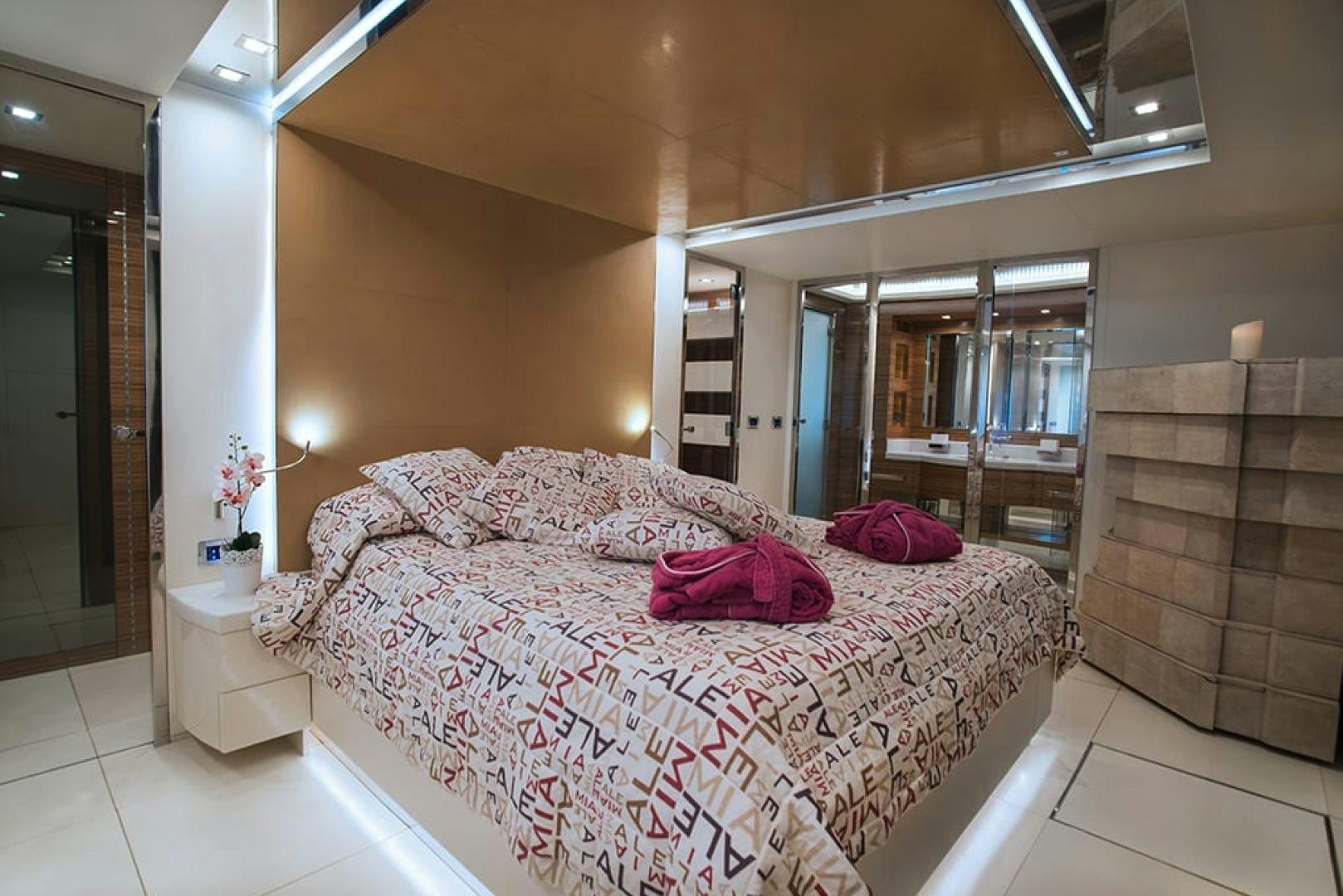 a bed in a room aboard ALE.MIA Yacht for Sale